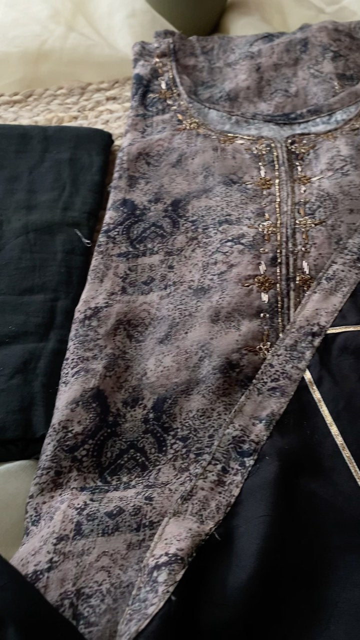 Muslin semi stitched suit with embroidered neckline